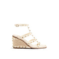 Valentino Garavani wedge sandals in beige calf leather