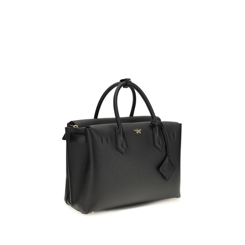 MCM Schwarze Kalbsleder Bos Taurus Handtasche