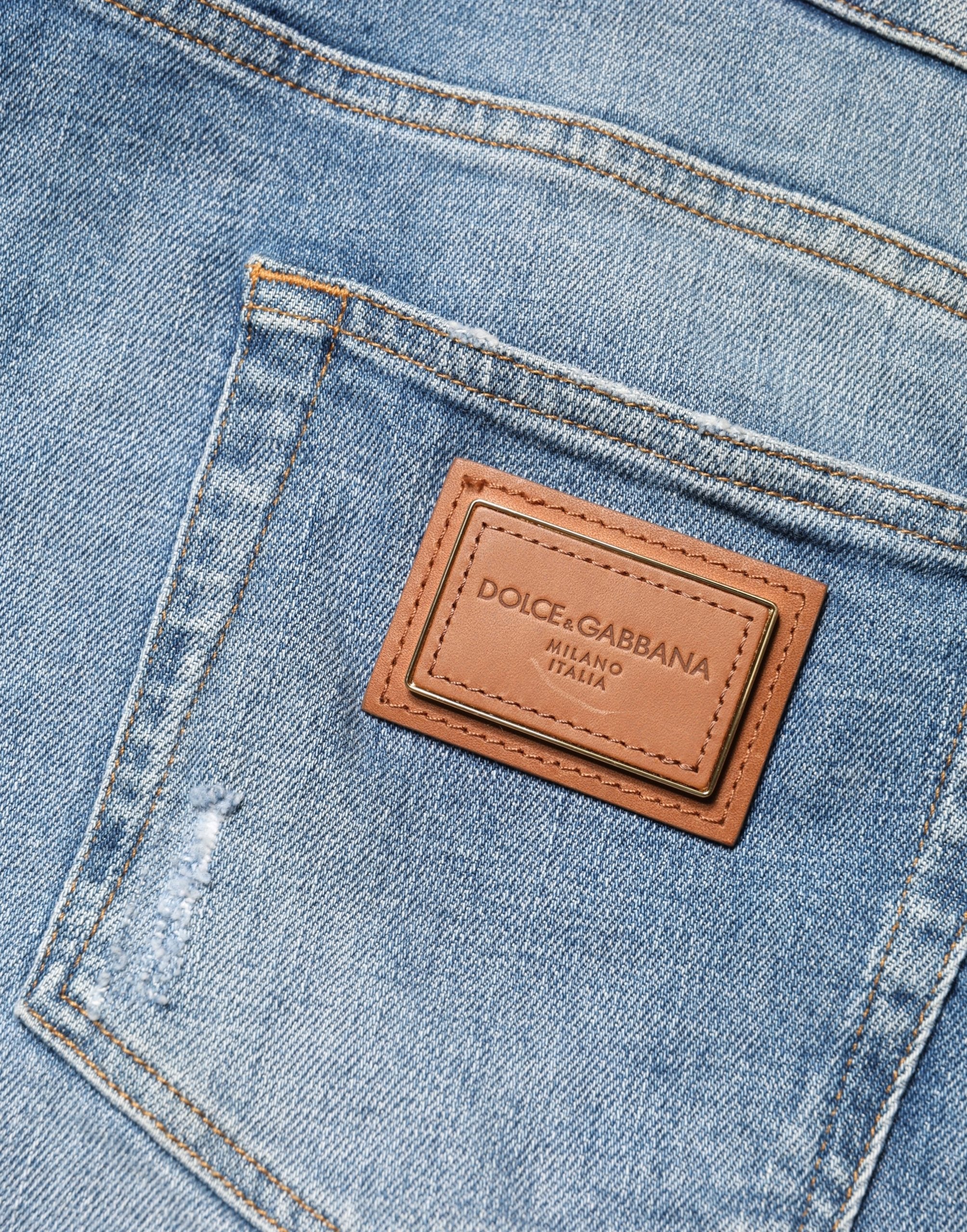Dolce & Gabbana Blaue, ausgefranste Slim Fit Herren Jeans aus Baumwolle