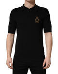 Dolce & Gabbana Schwarzes Polo-Shirt aus Seide mit heraldischem Wappen-Patch