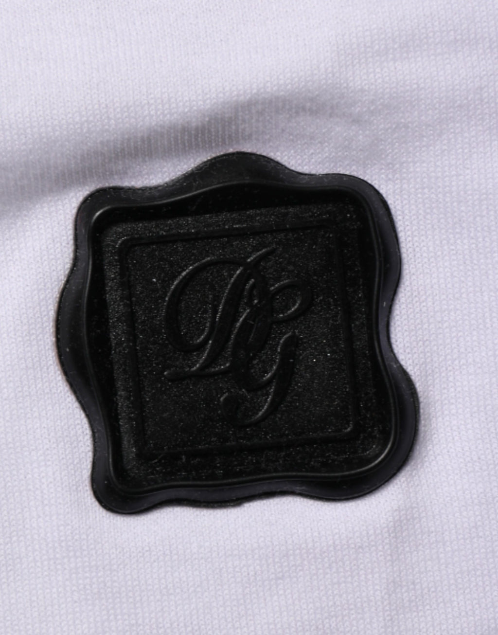 Dolce & Gabbana Weißes Baumwoll-T-Shirt mit Rundhalsausschnitt und Logo-Patch