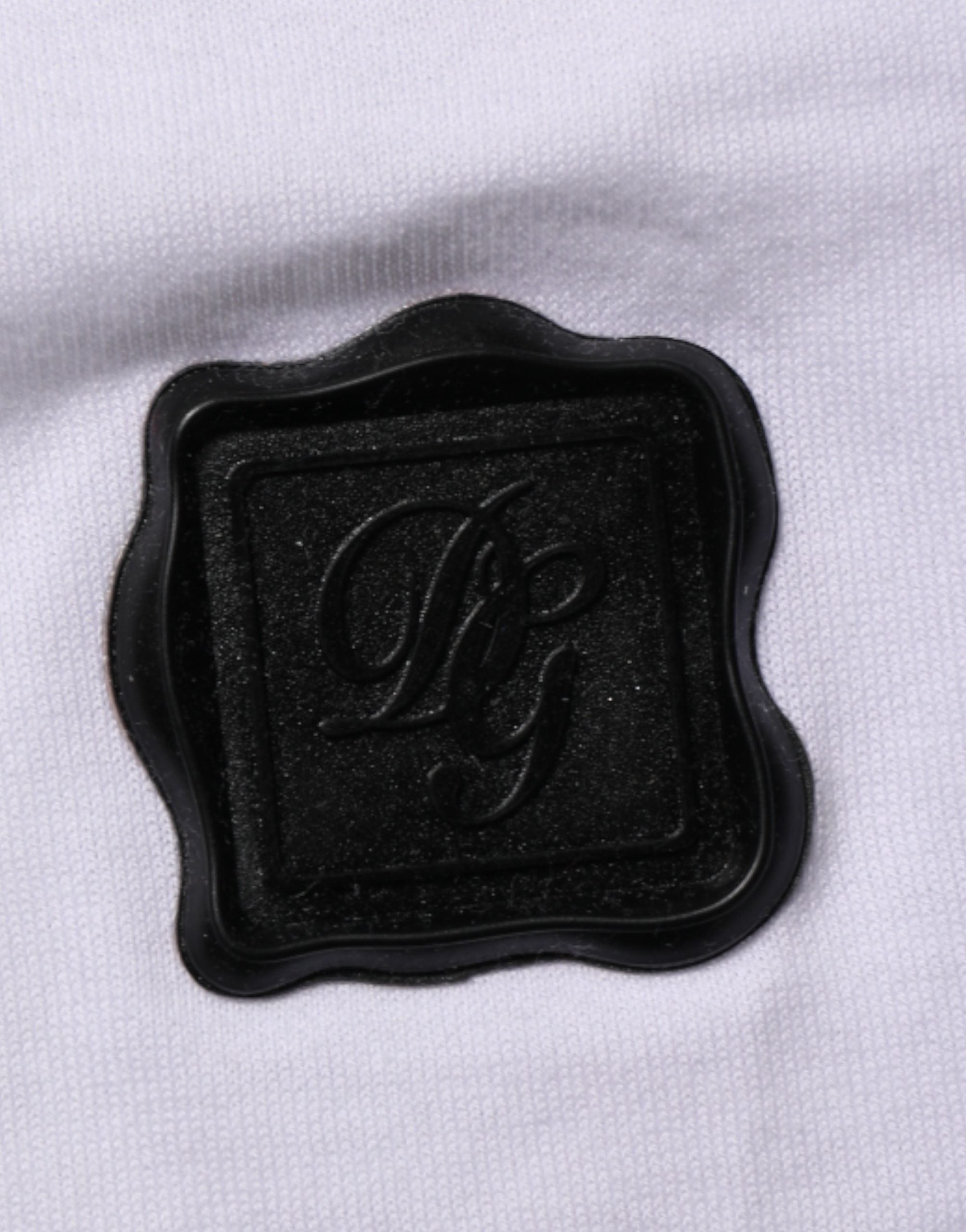 Dolce & Gabbana Weißes Baumwoll-T-Shirt mit Rundhalsausschnitt und Logo-Patch