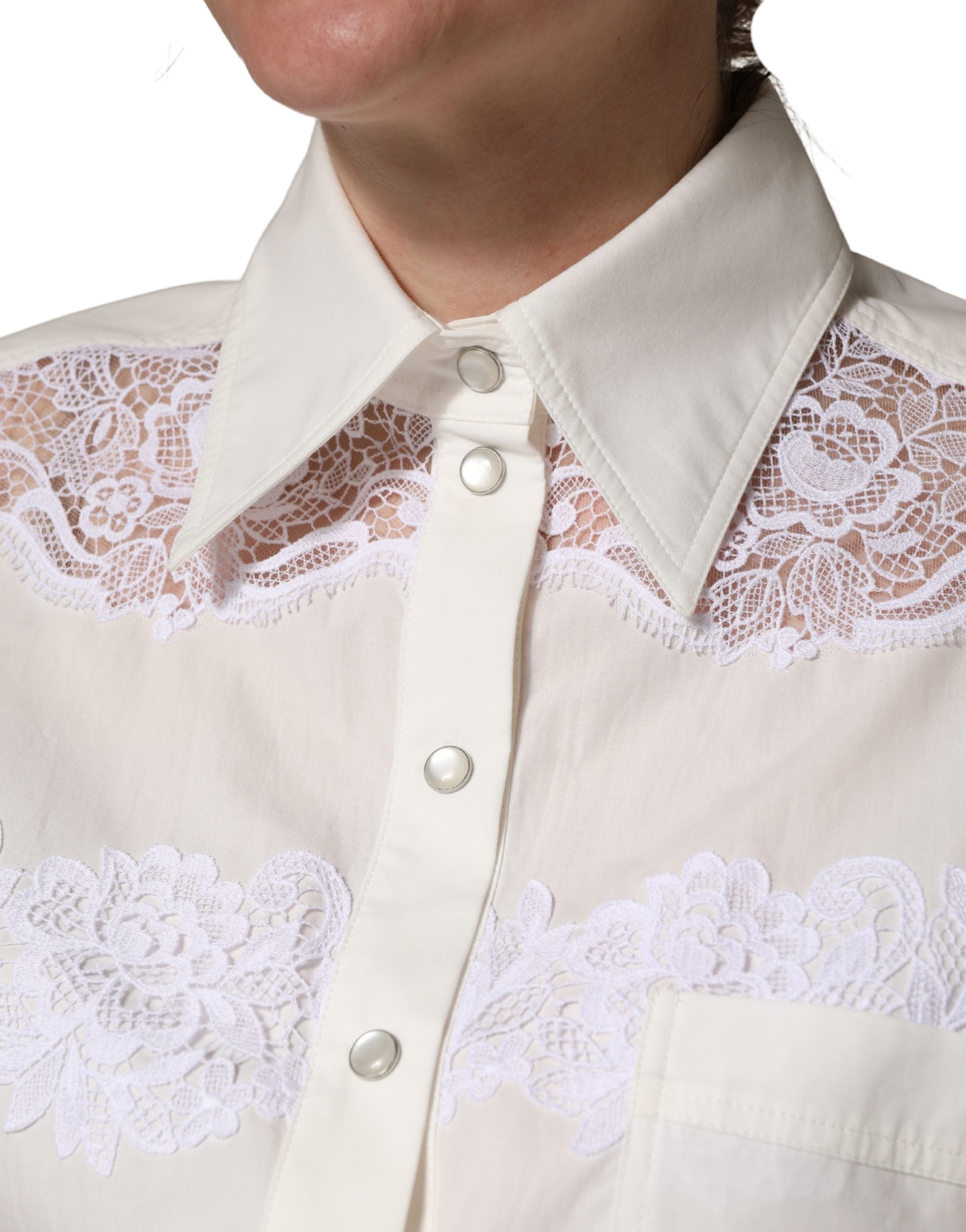 Dolce & Gabbana Jumpsuit aus weißer Baumwolle mit Spitzendetails und langen Ärmeln