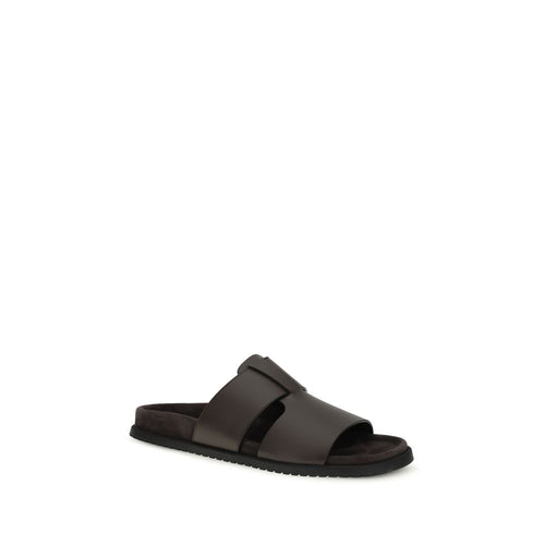 Dolce & Gabbana Braune Kalbsleder Bos Taurus Flache Sandalen