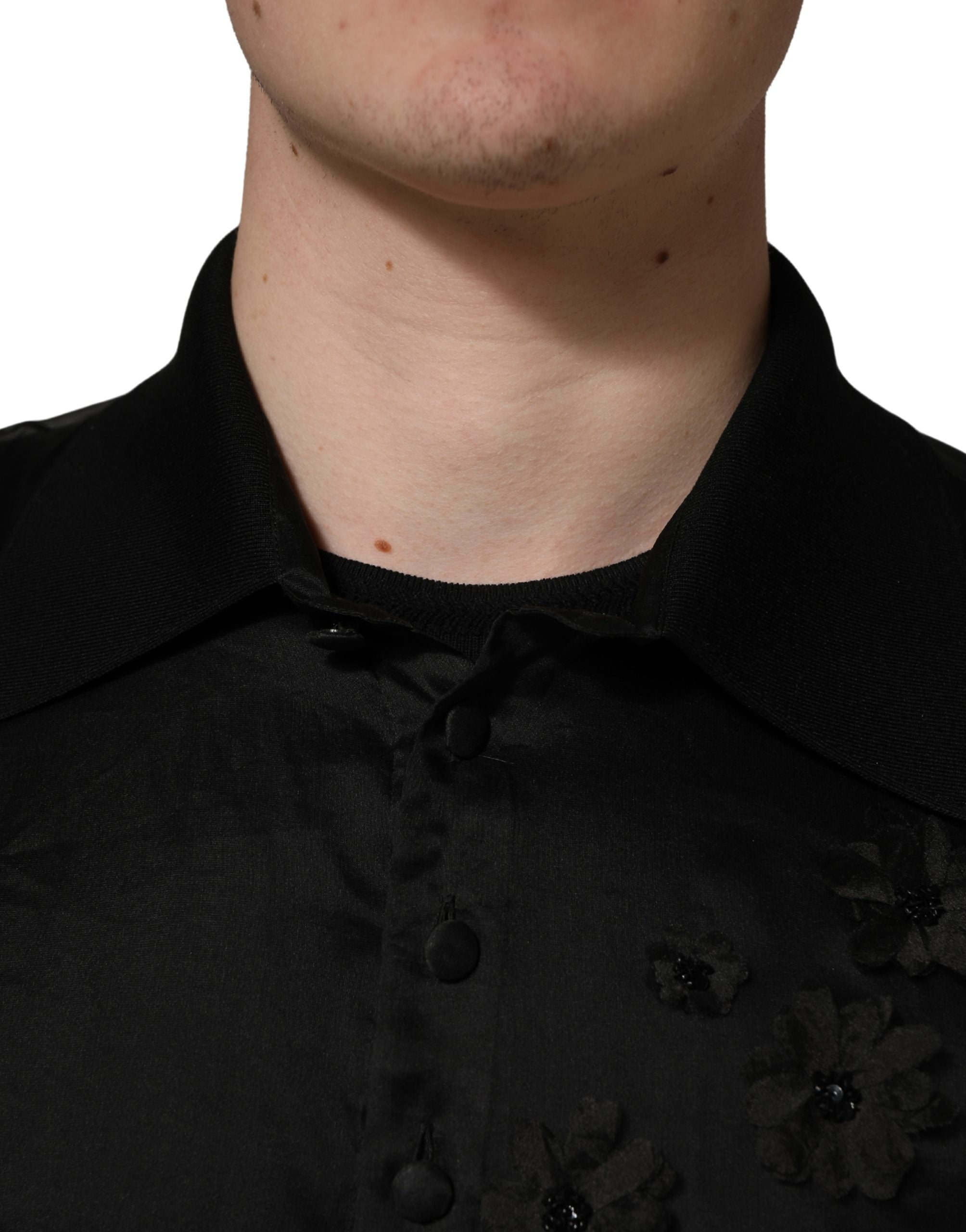 Dolce & Gabbana Schwarzes Shirt mit Blumenapplikationen und kurzen Ärmeln aus transparentem Stoff