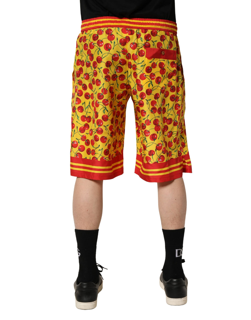 Dolce & Gabbana Bermuda-Shorts aus Seide mit gelbem Kirschen-Print