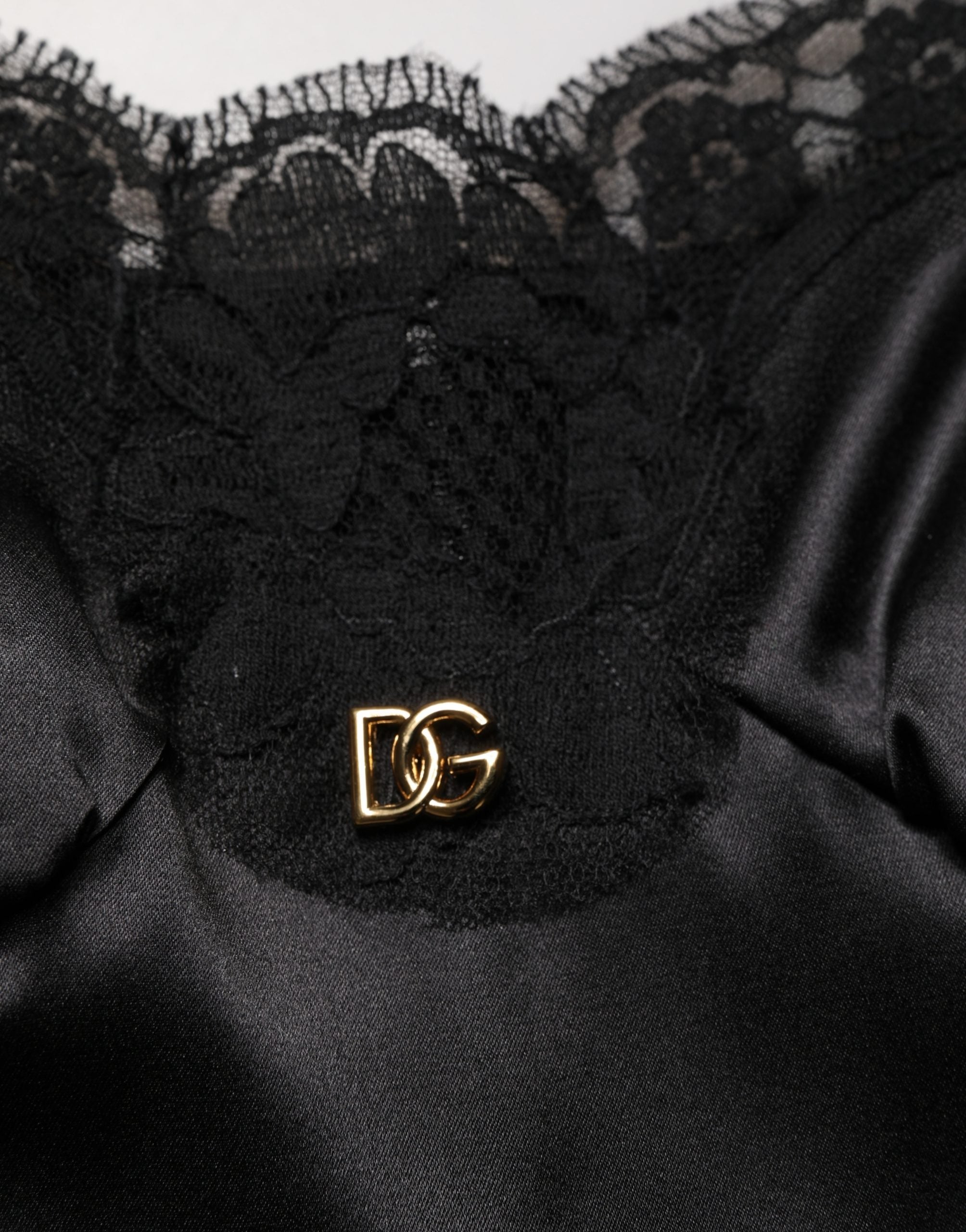 Dolce & Gabbana Schwarzes ärmelloses Minikleid aus Seidensatin mit Spitze
