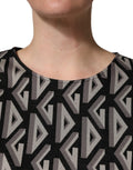 Dolce & Gabbana Schwarzes Kleid aus Baumwolle mit Logo-Print, knielang