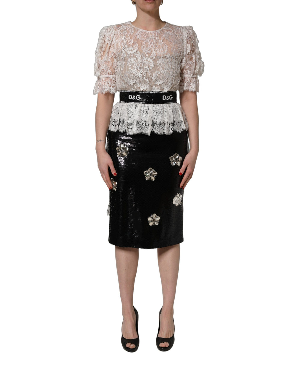 Dolce & Gabbana Kleid aus weißer Spitze mit schwarzem Rock und Verzierungen