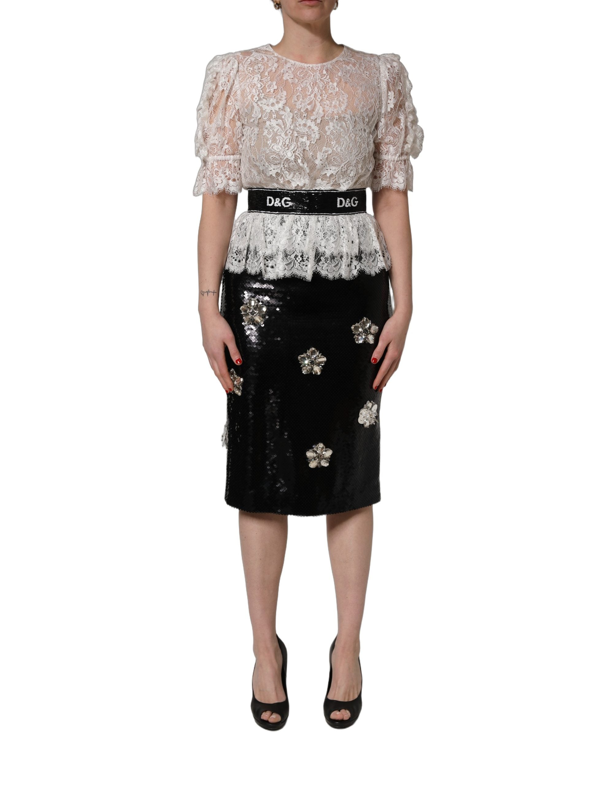 Dolce & Gabbana Kleid aus weißer Spitze mit schwarzem Rock und Verzierungen