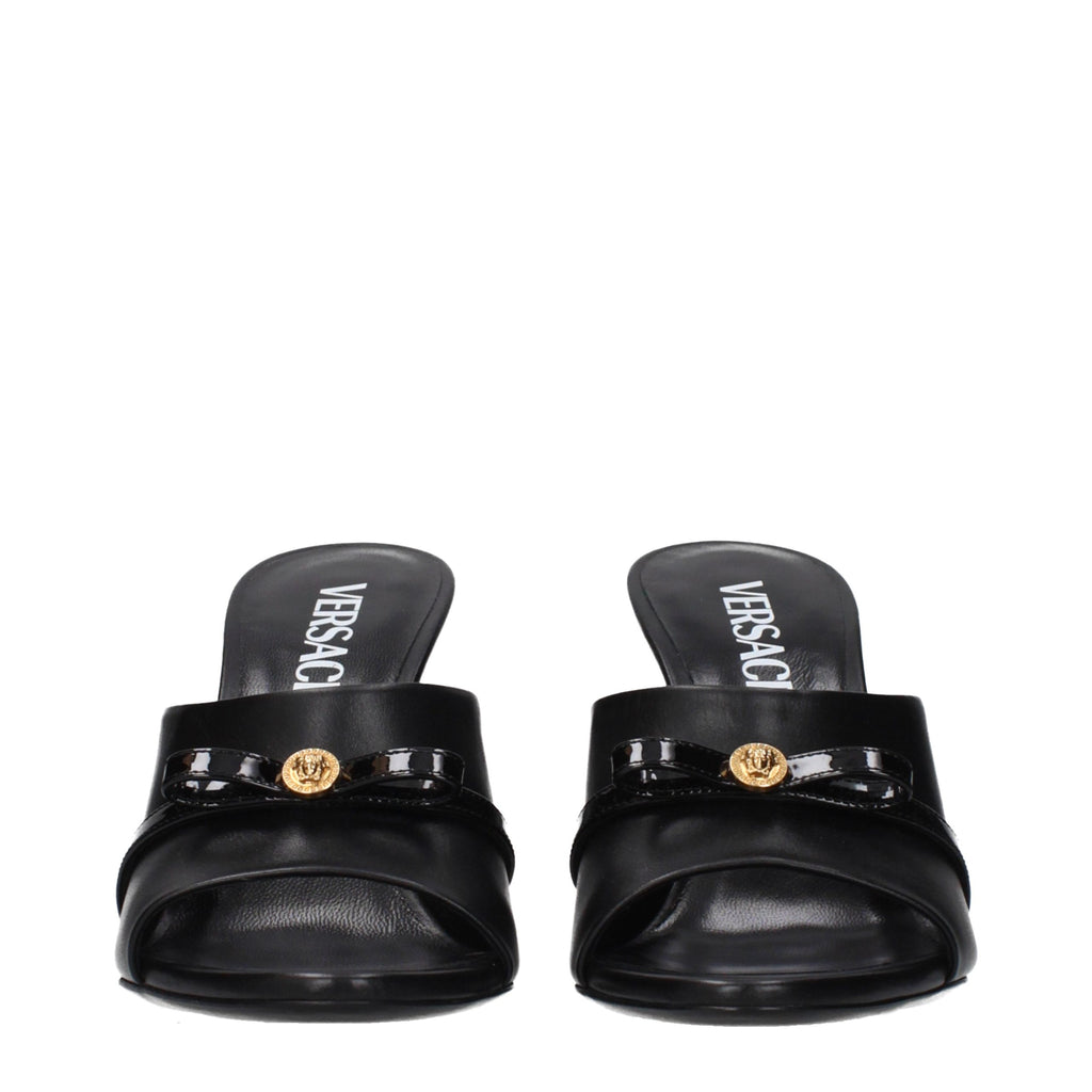 Versace Schwarze Keilsandalen aus Leder