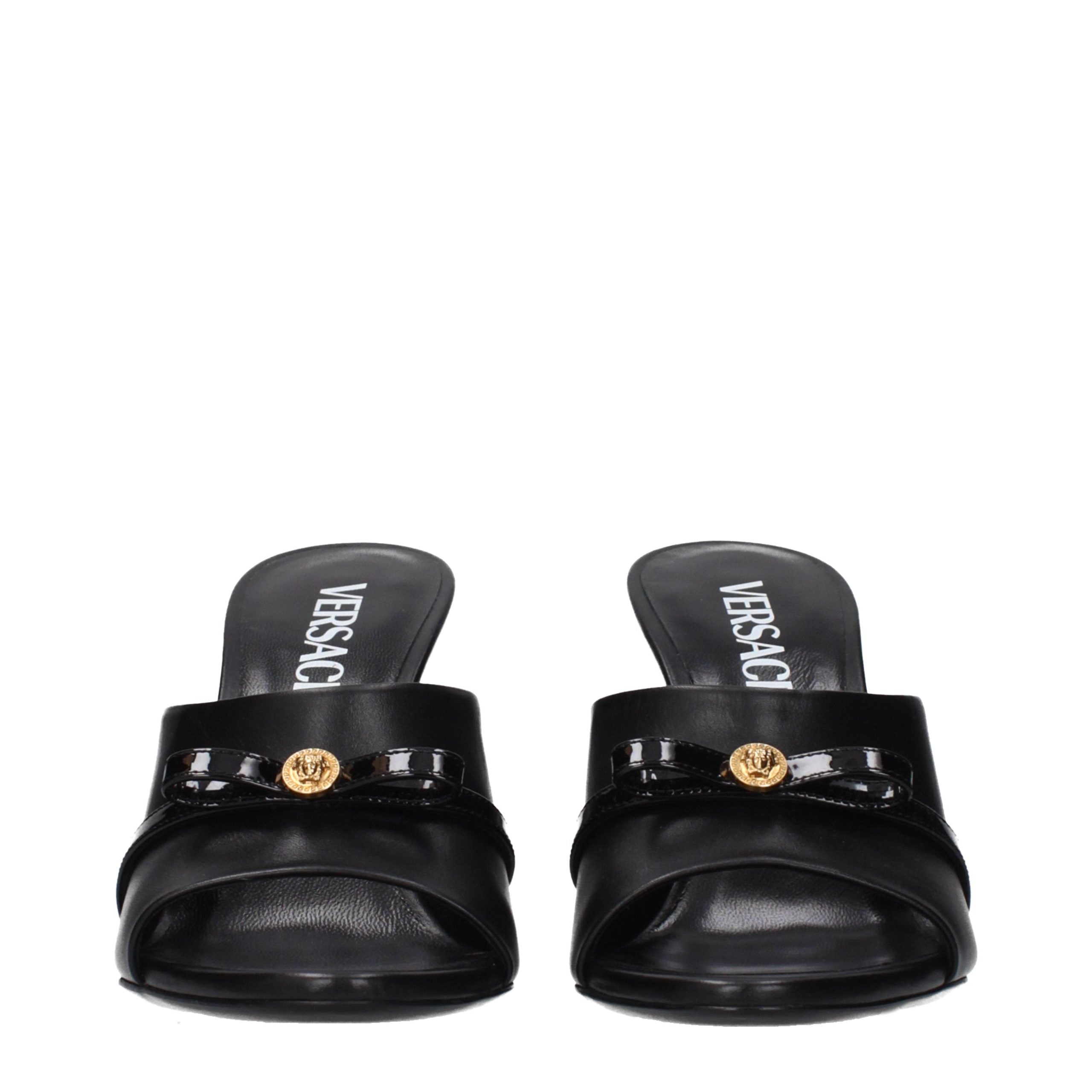 Versace Schwarze Keilsandalen aus Leder