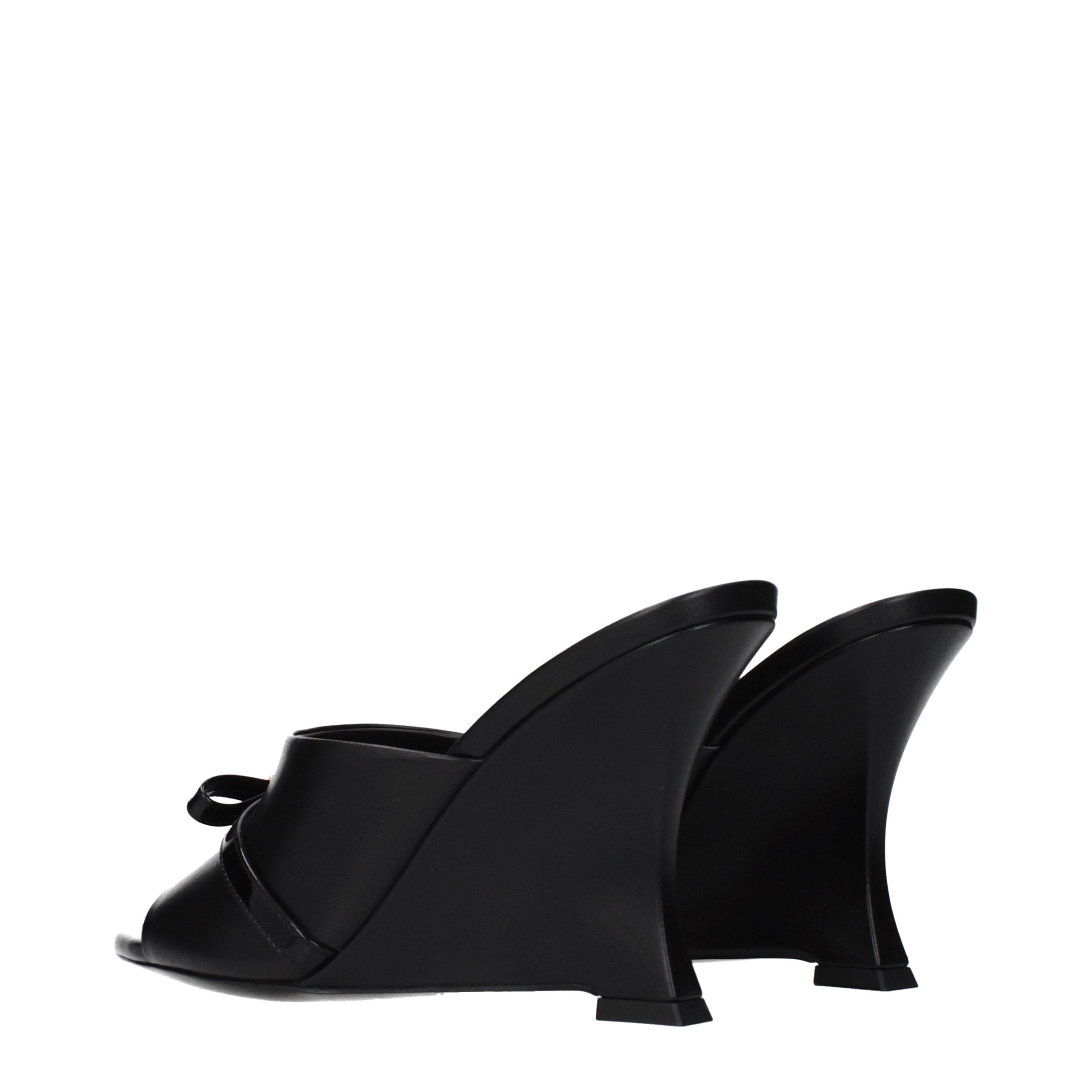 Versace Schwarze Keilsandalen aus Leder