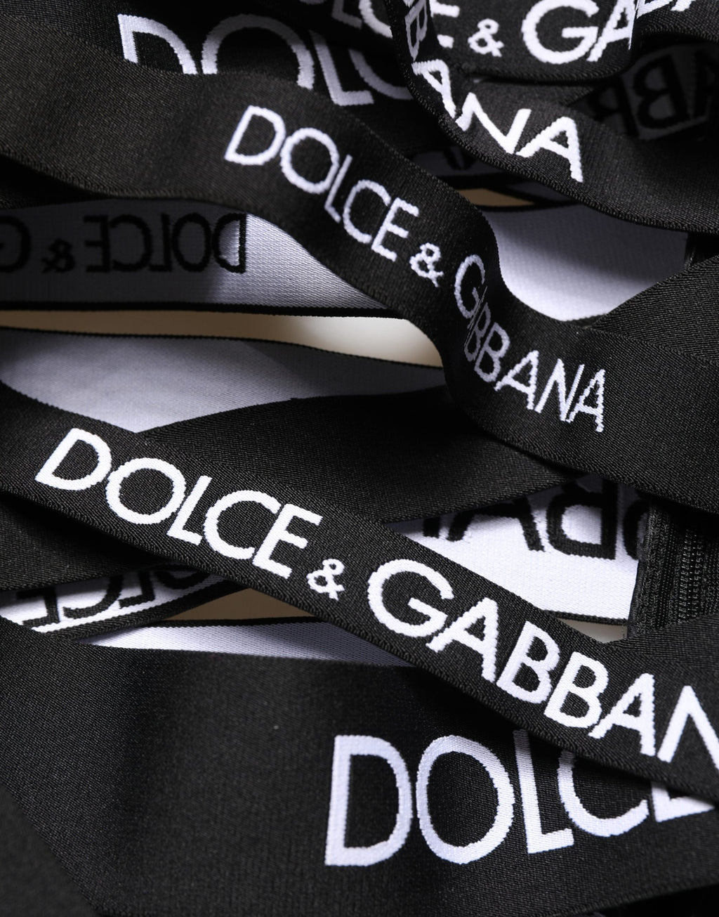 Dolce & Gabbana Schwarze Skinny High Waist Hose mit Logo-Tape und Cut-Out-Details