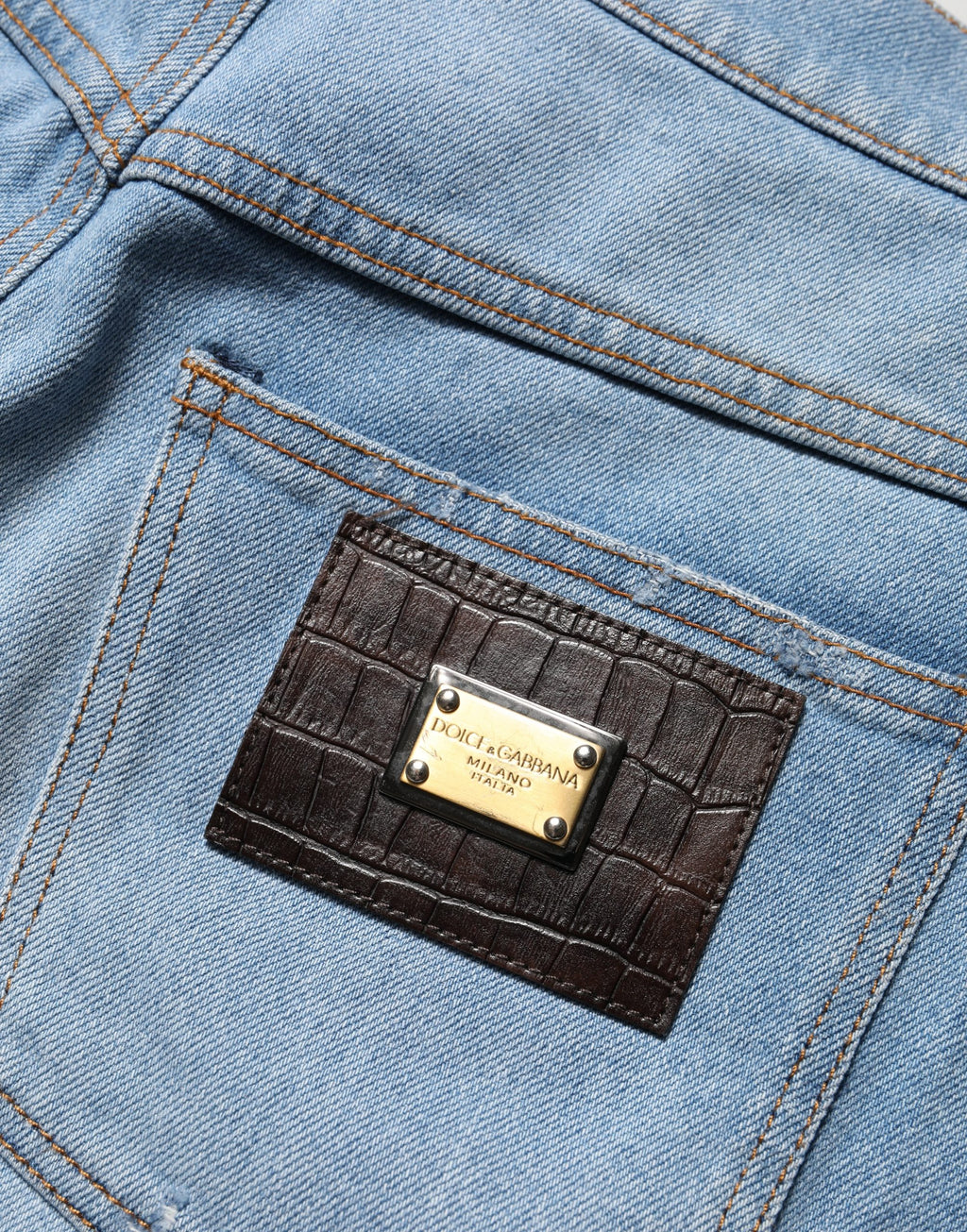 Dolce & Gabbana Blaue distressed Jeans aus Baumwoll-Denim mit Faltenlegung