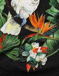 Dolce & Gabbana Schwarzes Baumwoll-T-Shirt mit tropischem Print und Rundhalsausschnitt