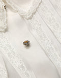 Dolce & Gabbana Weiße Rüschen-Bluse aus transparentem Seiden-Mix mit Knöpfen