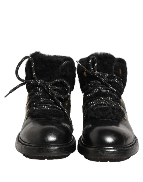 Dolce & Gabbana Schwarze Trekking-Stiefel aus Leder mit Schnürung und Pelzbesatz