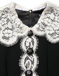 Dolce & Gabbana Midi-Kleid mit langen Ärmeln und schwarzen Spitzendetails