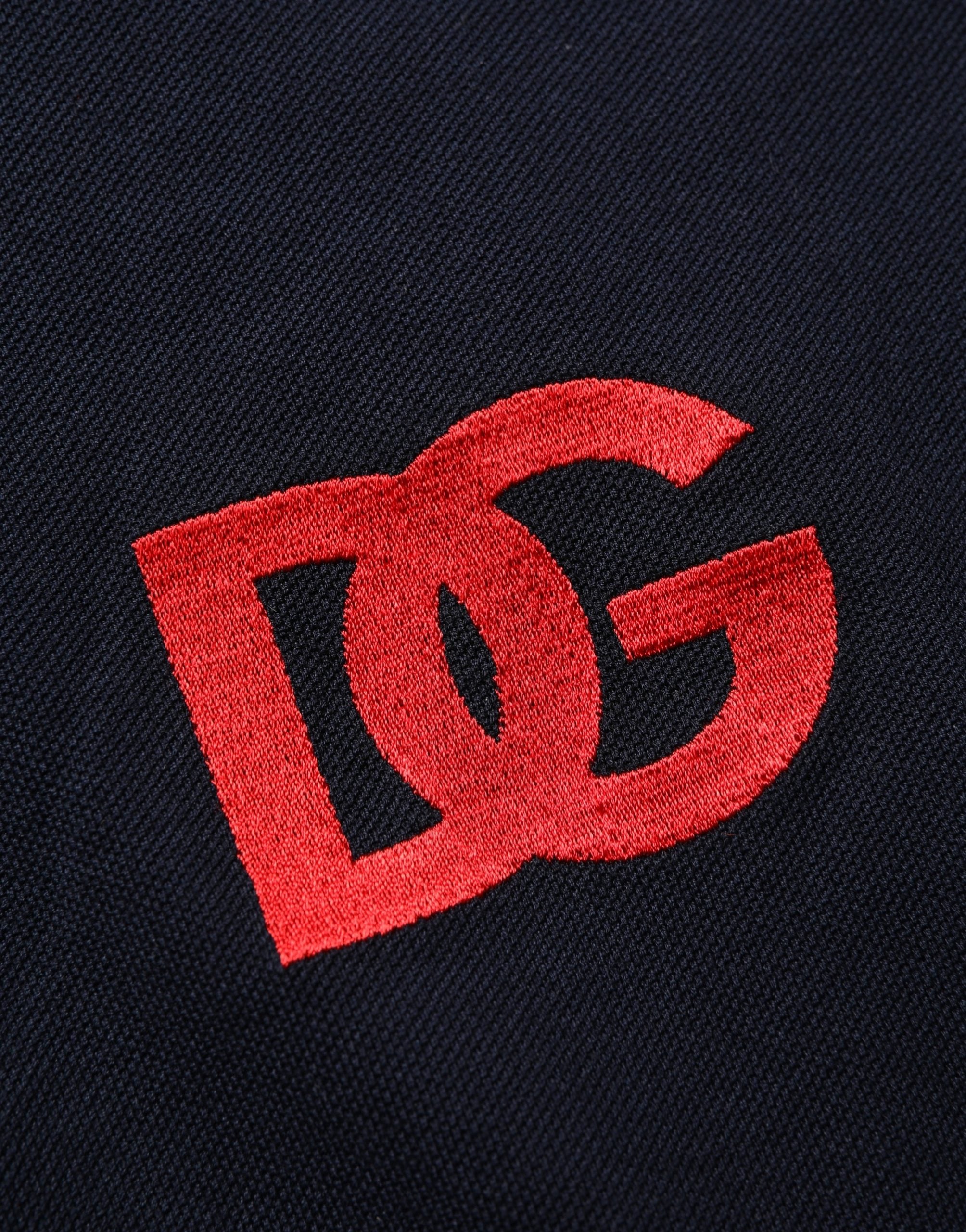 Dolce & Gabbana Schwarzes Polo-Shirt mit DG-Logo-Print und kurzen Ärmeln
