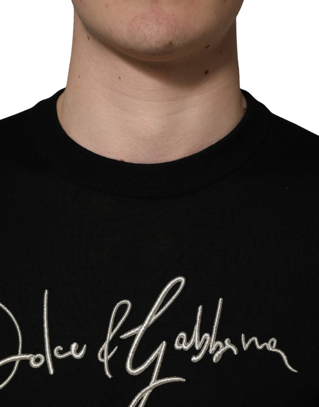 Dolce & Gabbana Schwarzer Pullover mit Rundhalsausschnitt und gesticktem Logo