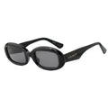 Nina Ricci Schwarze Sonnenbrille aus Acetat