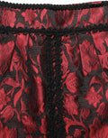 Dolce & Gabbana Minirock aus rotem und schwarzem Blumen-Jacquard mit Spitze