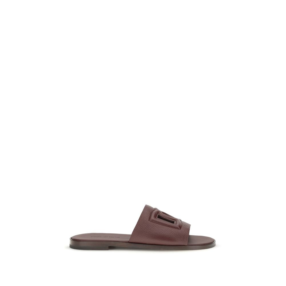 Dolce & Gabbana Braune Kalbsleder Bos Taurus Flache Sandalen