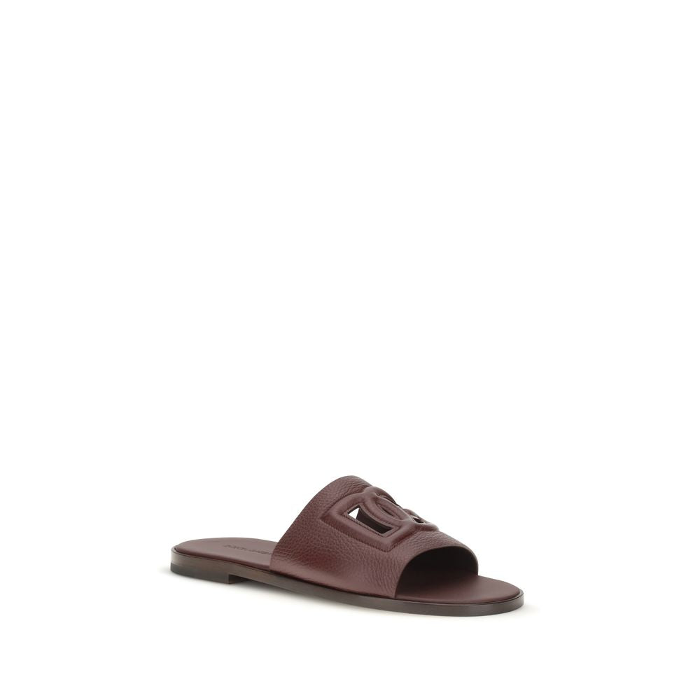 Dolce & Gabbana Braune Kalbsleder Bos Taurus Flache Sandalen