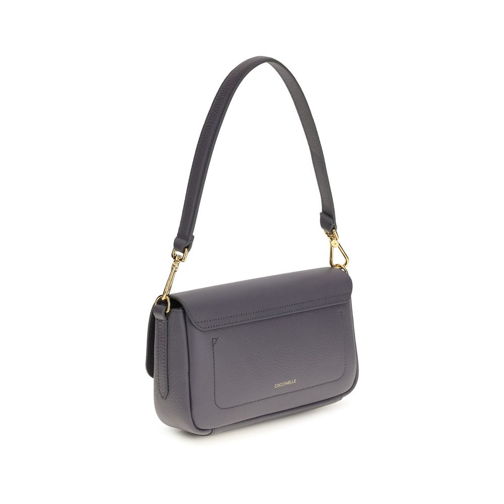Coccinelle Schultertasche aus blauem Kalbsleder Bos Taurus
