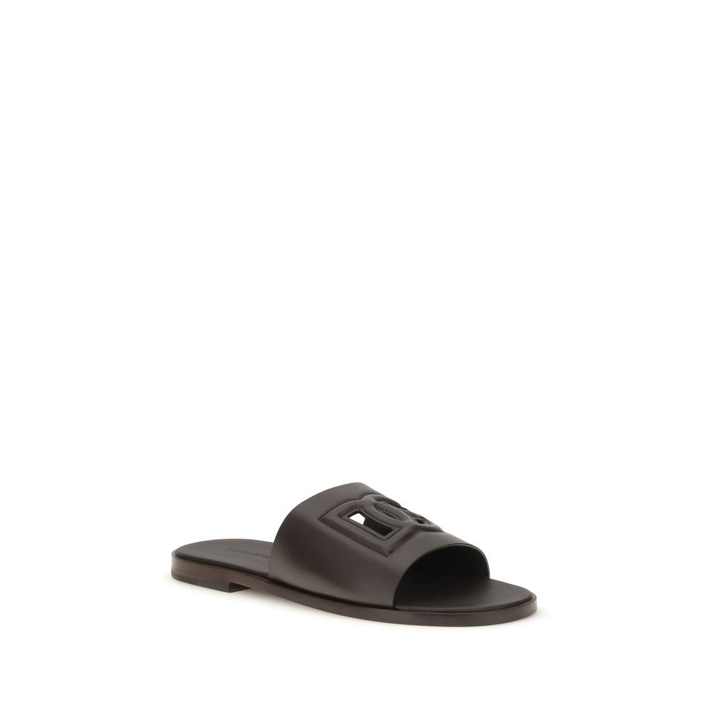 Dolce & Gabbana Braune Kalbsleder Bos Taurus Flache Sandalen