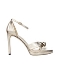 Jimmy Choo Goldene Ledersandalen mit Plateauabsatz