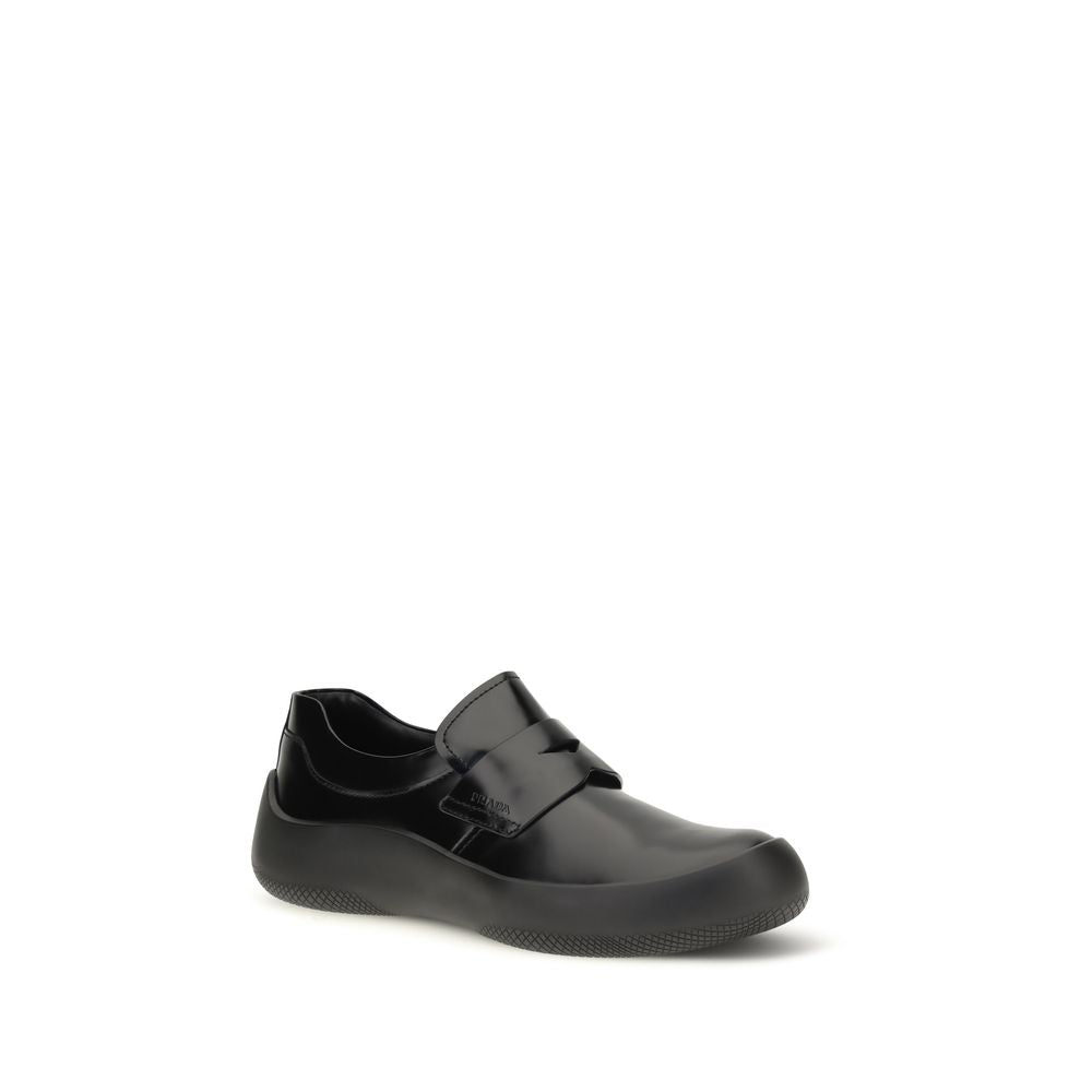 Prada Schwarze "Bos Taurus" Kalbsleder Loafer zum Hineinschlüpfen