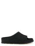 UGG Schwarze Leder-Slipper