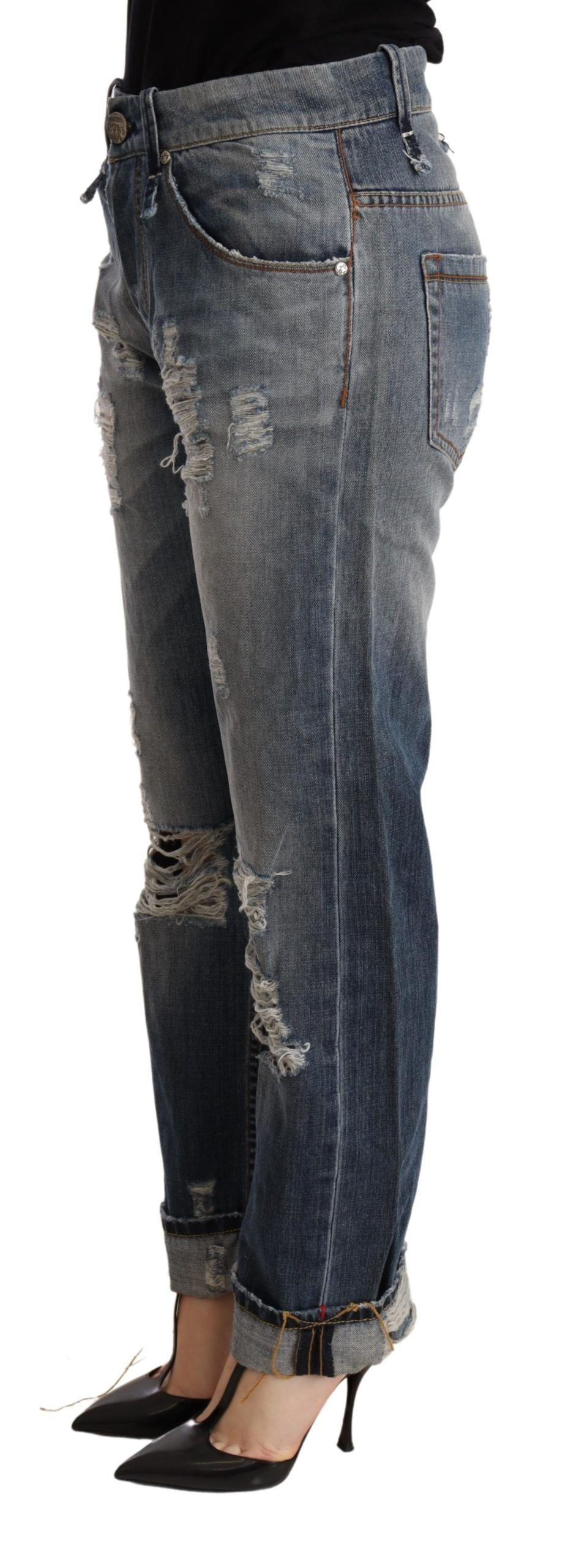 Eight pairs of distressed blue mid-rise denim trousers