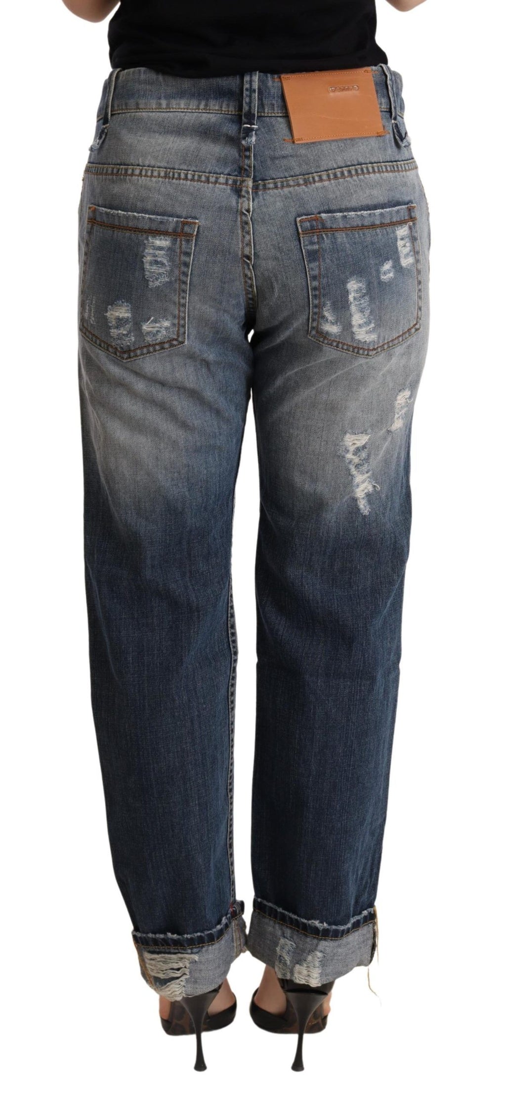 Eight pairs of distressed blue mid-rise denim trousers