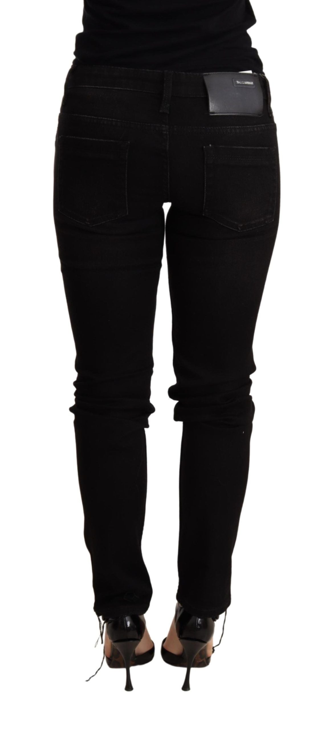 Eight black low-rise skinny denim jeans