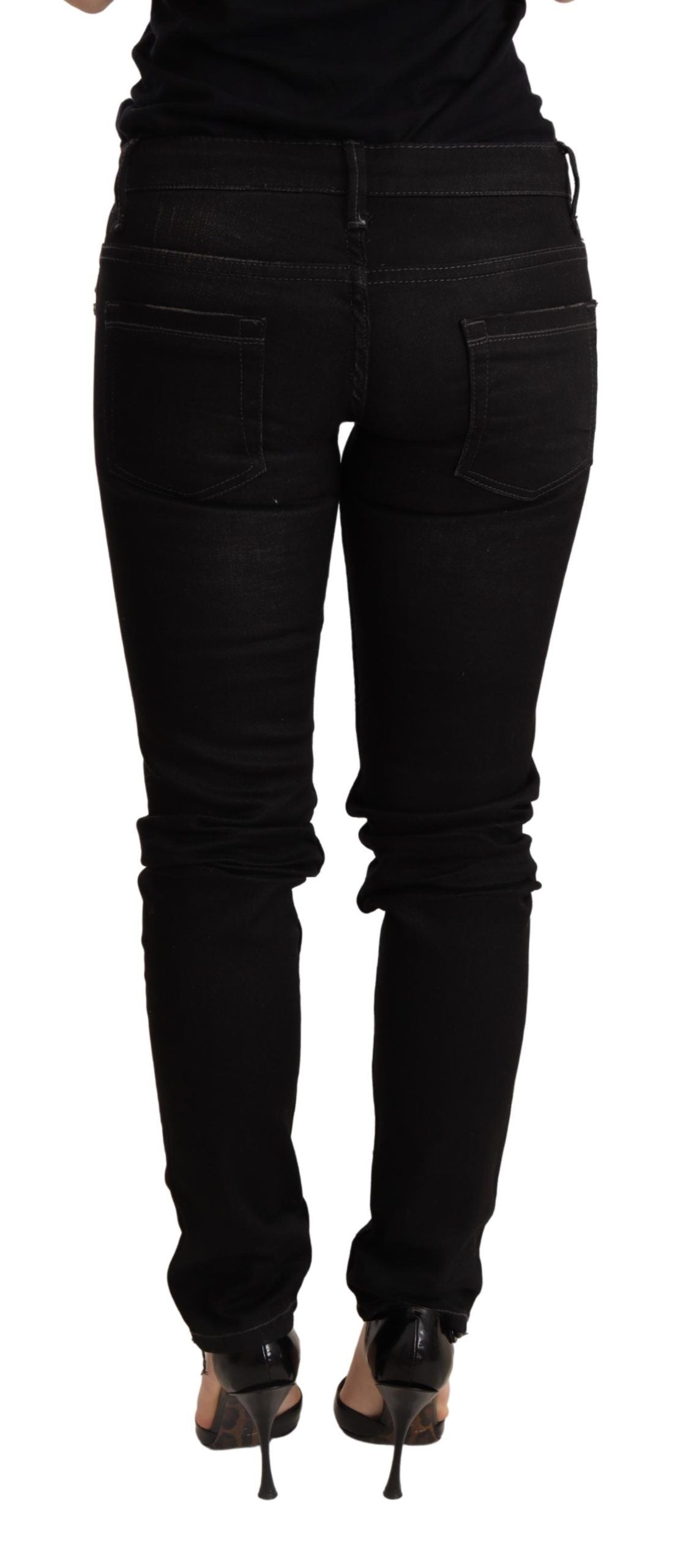 Eight black low-rise skinny denim jeans