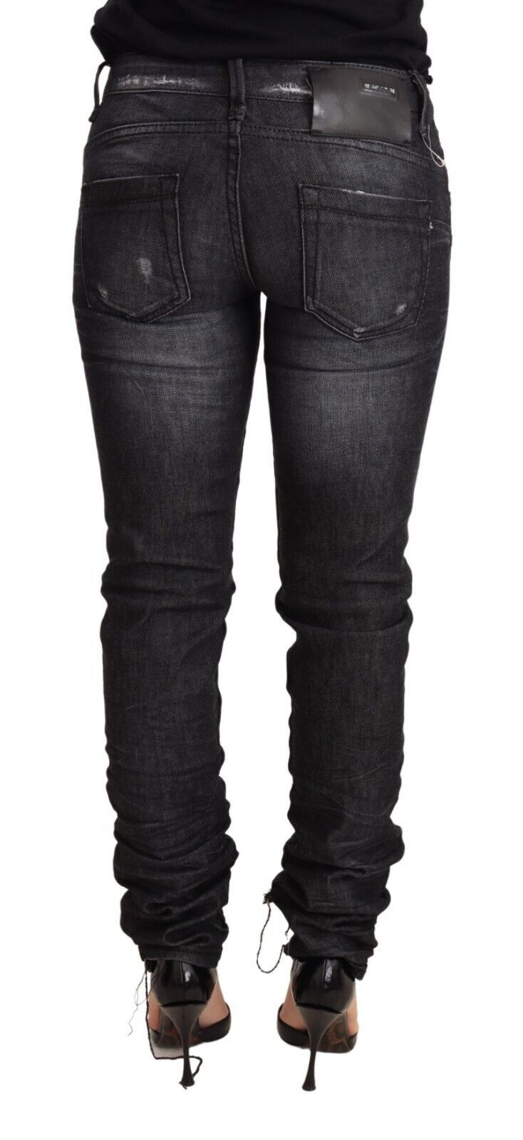 Eight pairs of black low-rise washed cotton skinny denim jeans