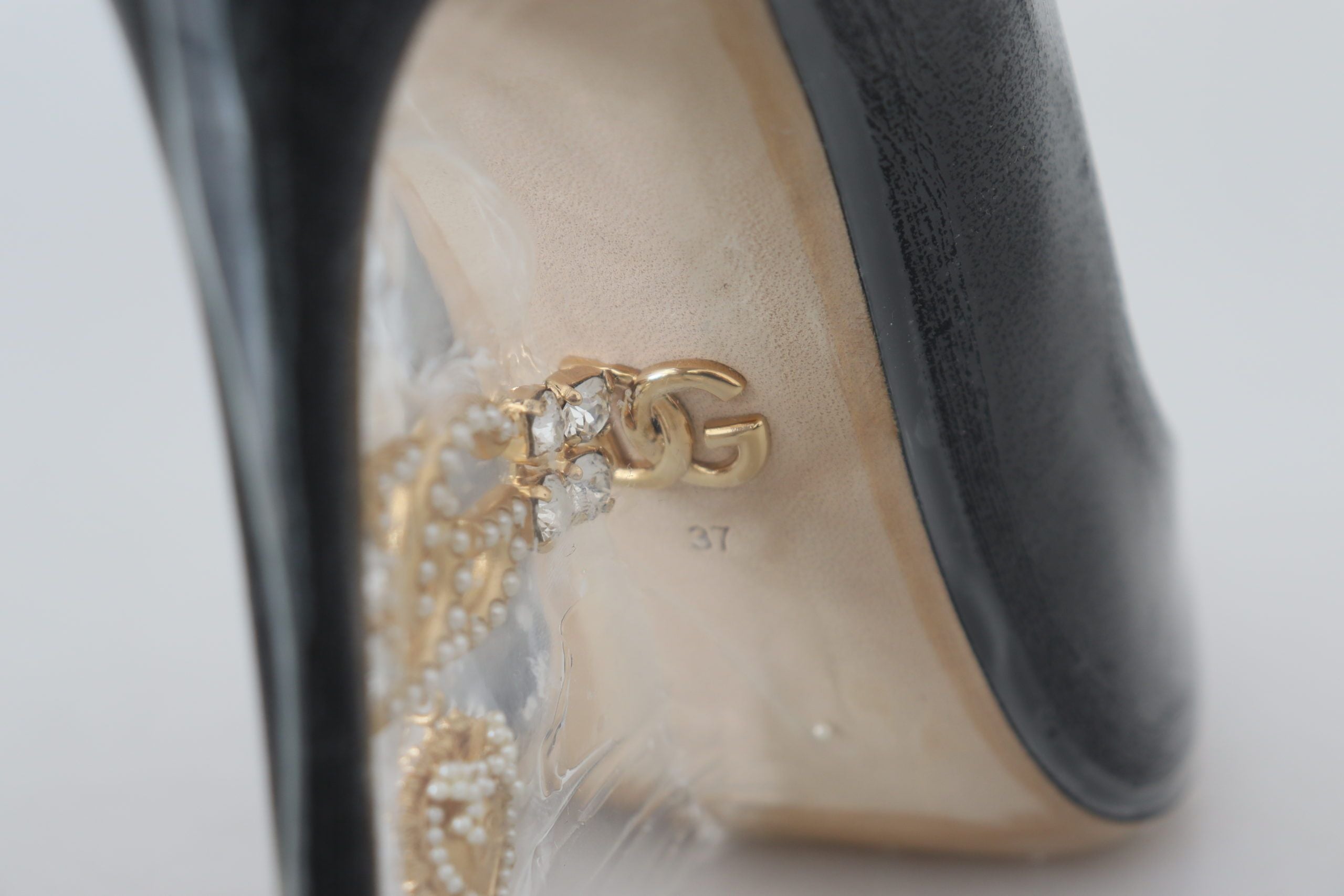 Dolce & Gabbana Schwarze Lederabsätze Pumps Kunststoffummantelte Schuhe