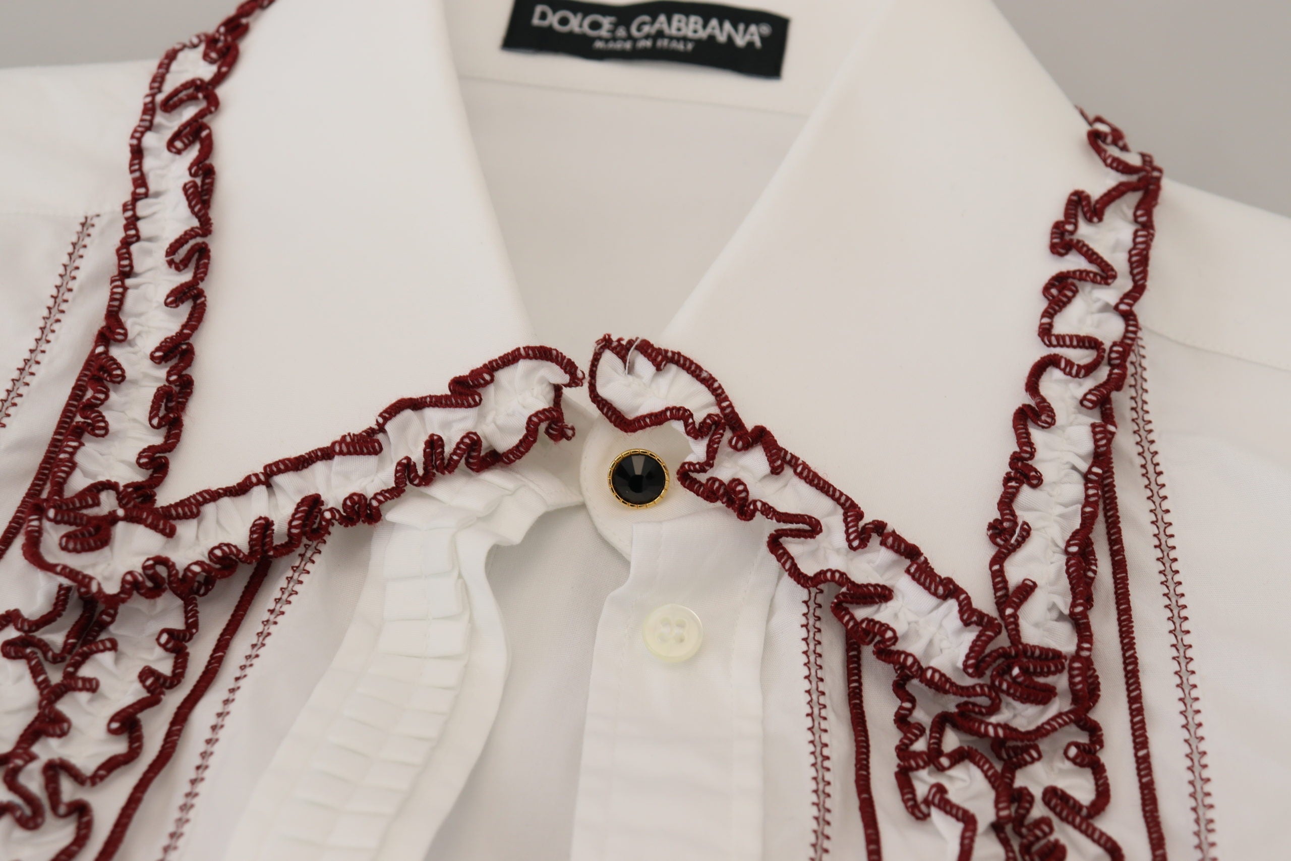 Dolce & Gabbana Weißes Spitzen-Top mit langen Ärmeln und Rüschenkragen
