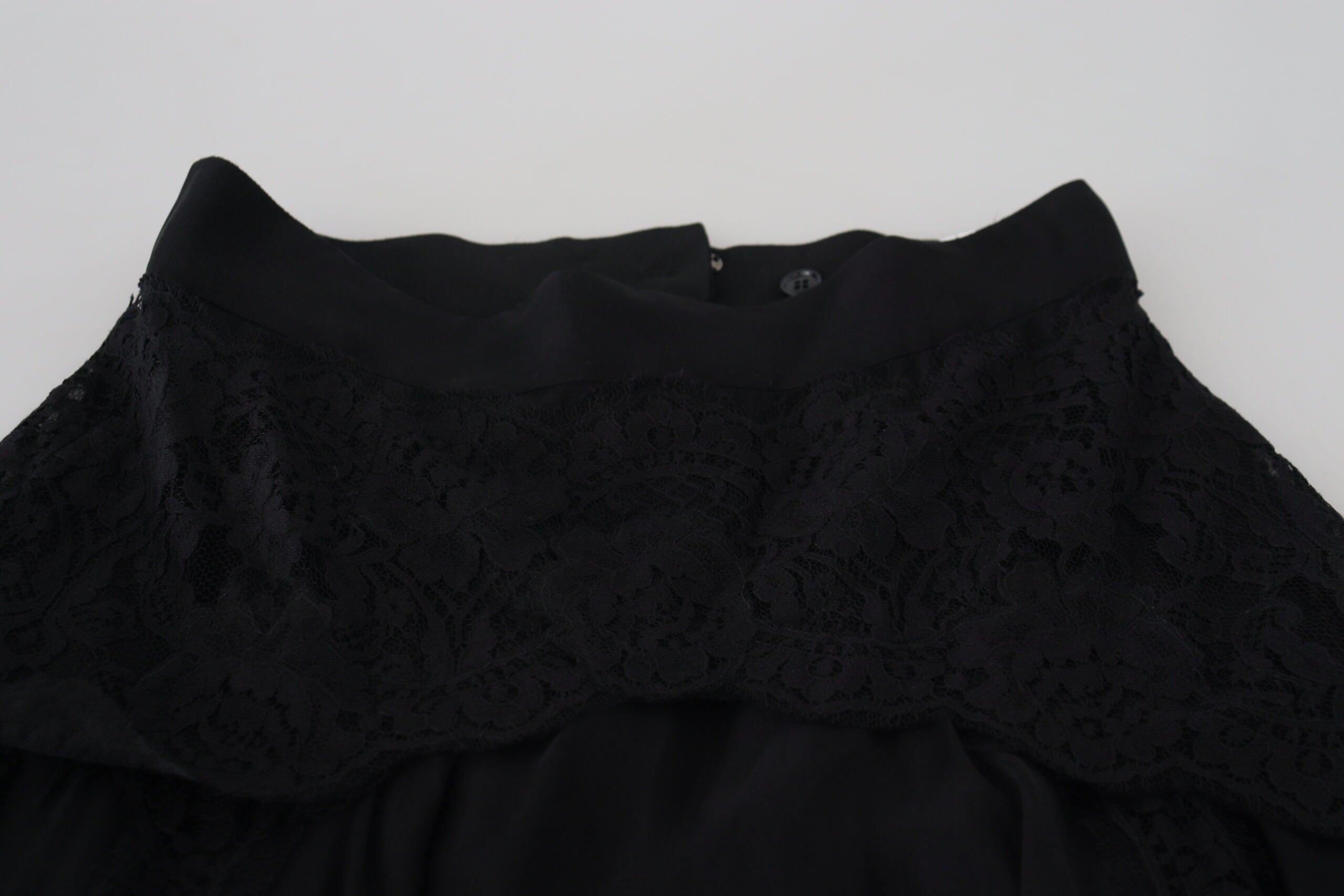 Dolce & Gabbana Schwarzer Seiden-Spitzenbesatz Midirock mit hoher Taille