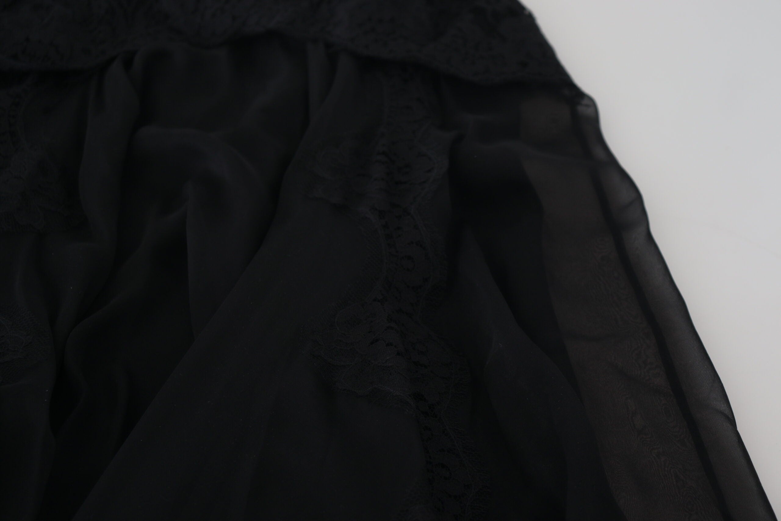 Dolce & Gabbana Schwarzer Seiden-Spitzenbesatz Midirock mit hoher Taille