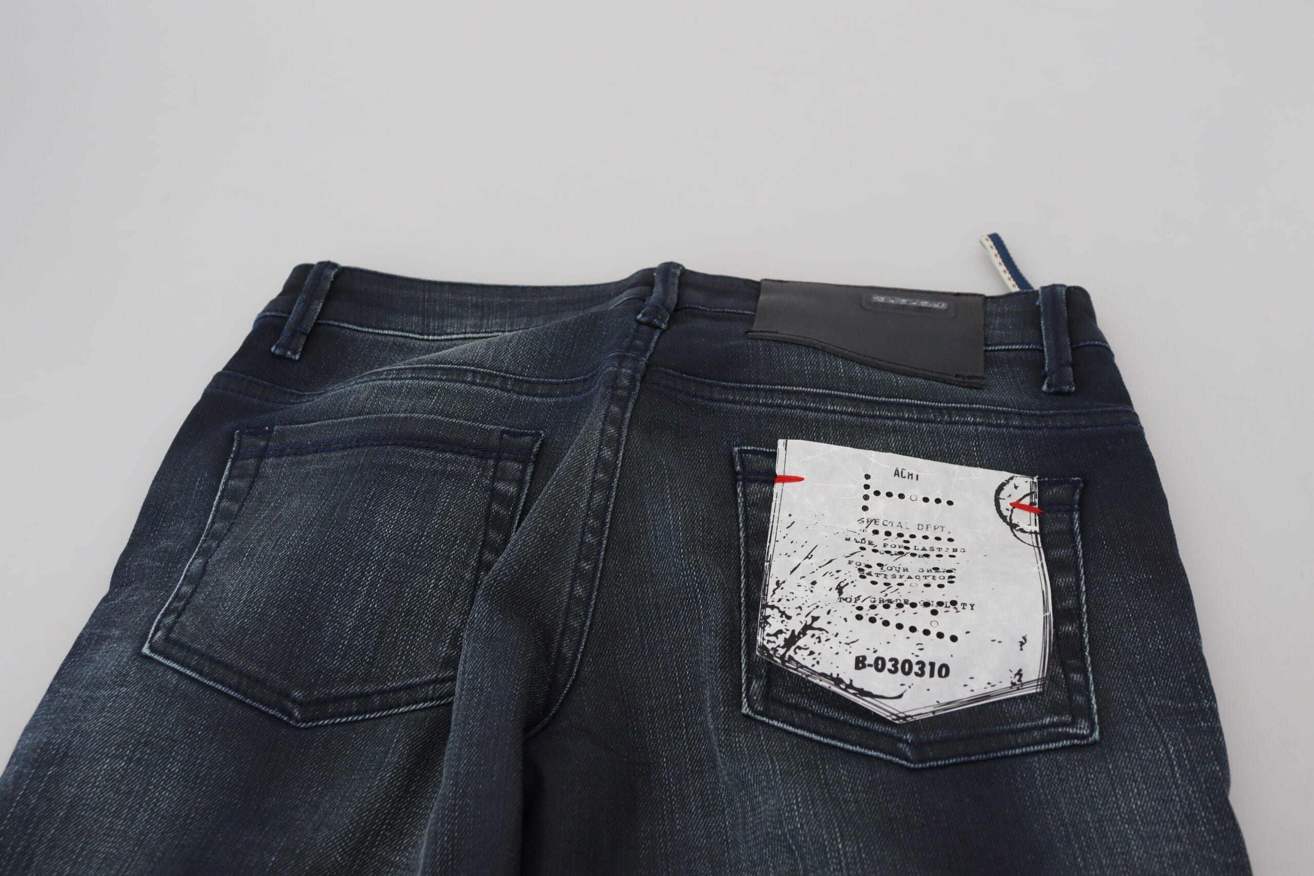 Eight blue washed low-rise slim-fit jeans in cotton denim