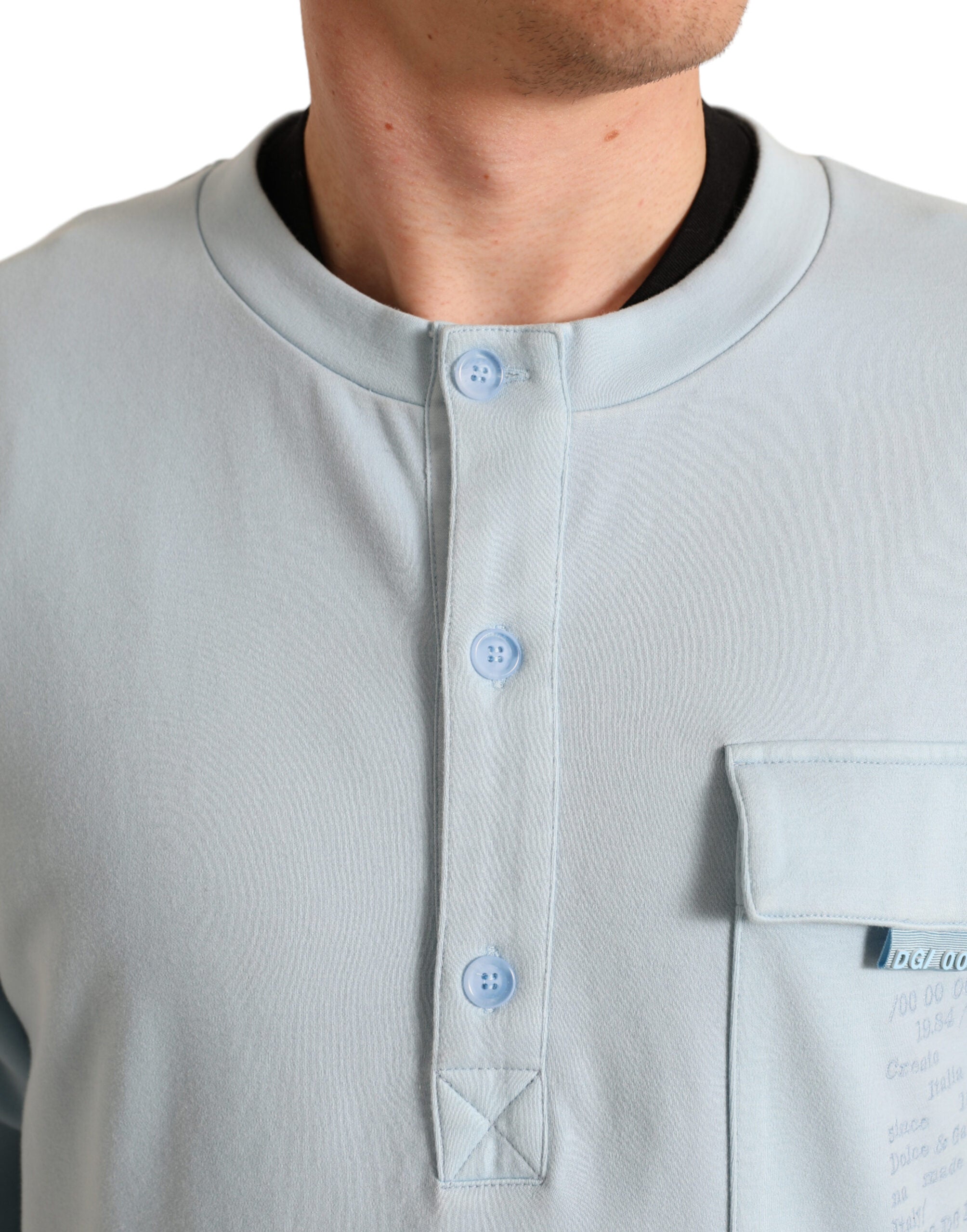 Dolce & Gabbana Hellblauer Pullover aus Baumwolle mit Knöpfen