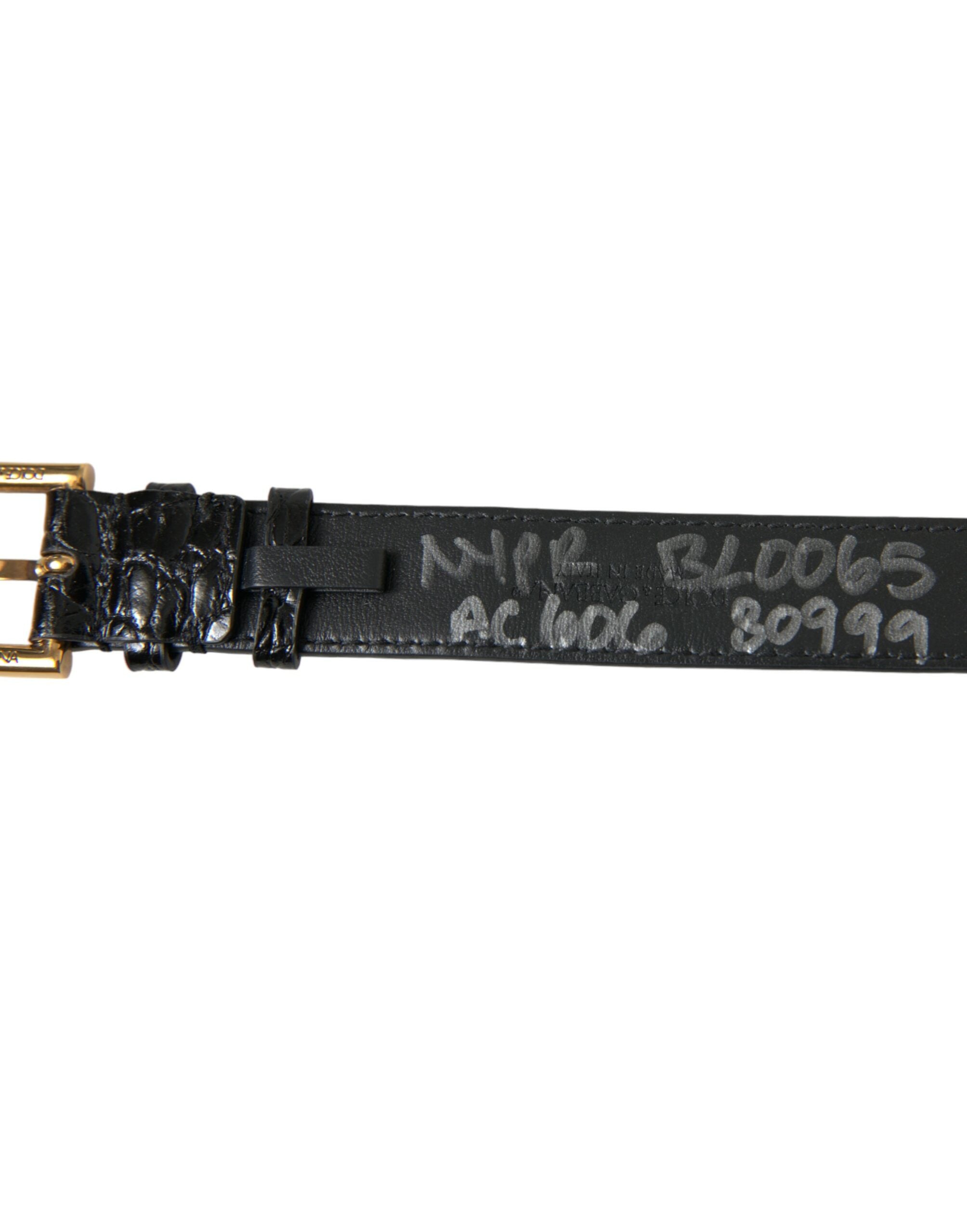 Dolce & Gabbana Schwarzes strukturiertes Leder mit goldfarbener Metallschnalle Armband
