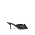 Dolce & Gabbana Sandalen mit Schlangenhaut-Print und Plateauabsatz in Schwarz