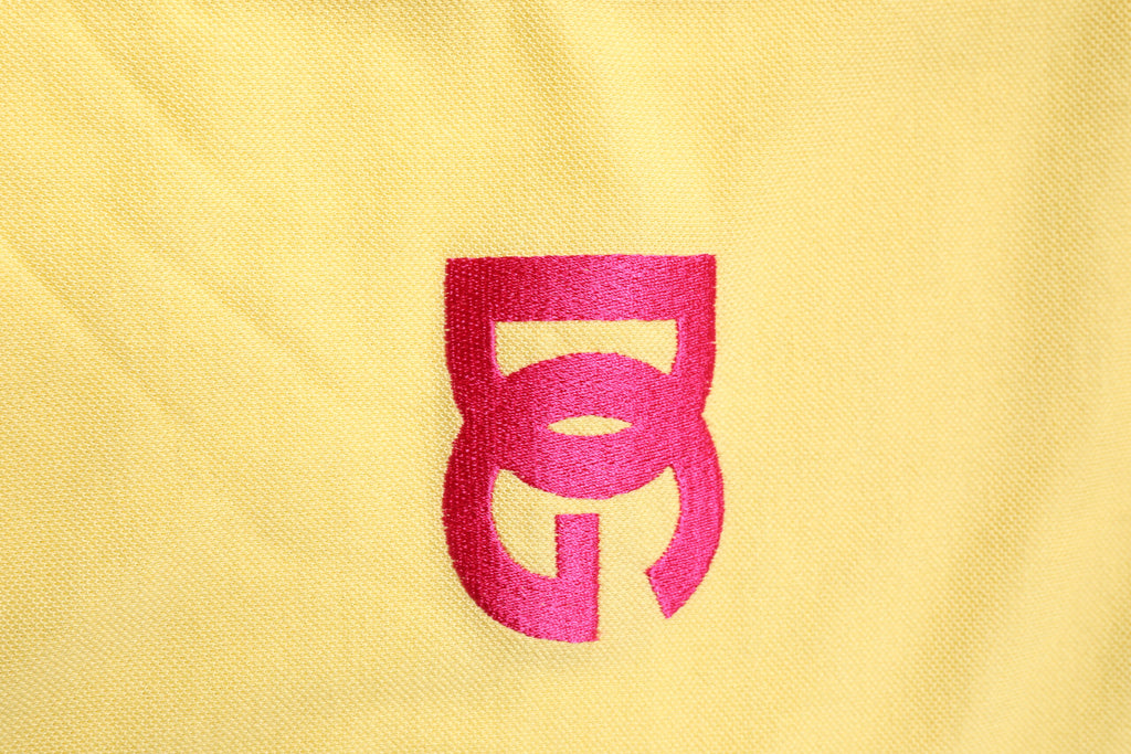 Dolce & Gabbana Gelbes Logo-Polo-T-Shirt aus Baumwolle mit Kragen
