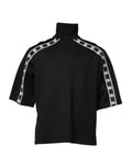 Dolce & Gabbana Schwarzes Rollkragen-T-Shirt mit DG-Druck aus Baumwolle