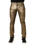 Dolce & Gabbana Goldfarbene zerfetzte Baumwoll-Stretch-Denim-Jeans